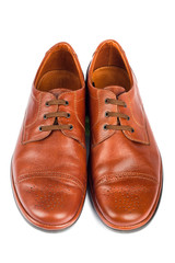 The brown elegant men's shoes on the white isolated background