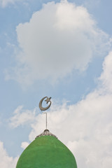 The top of the tiled dome of the ancient mosque in thailand