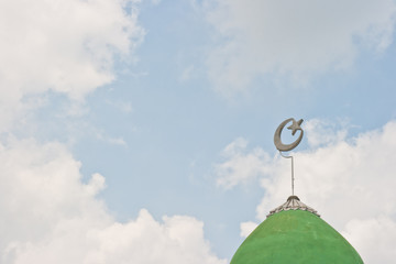 The top of the tiled dome of the ancient mosque in thailand