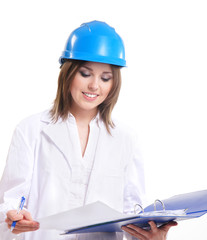 Young attractive female engineer isolated on white