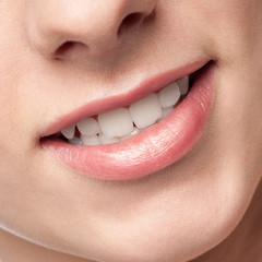 Fototapeta premium Close-up lips of beauty young woman