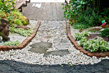 Stone walkway winding in garden