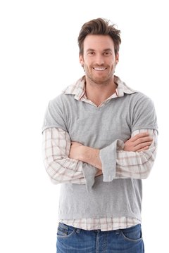 Confident man smiling arms crossed