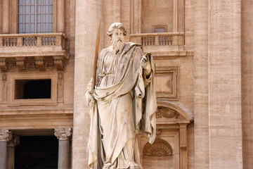 Statue of Saint Paul with his sword, looking down at us