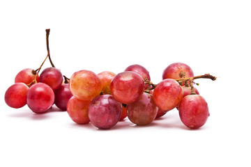 Perfect bunch of red grapes isolated on white background