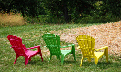 Fototapeta premium Colourful Muskoka Chairs