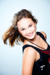Fototapeta premium Portrait of young beautiful disco dancer girl
