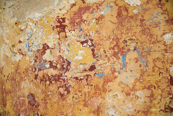 peeling paint texture with several warm colors