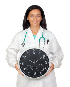 Adorable doctor with a big clock
