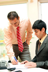 Two businessmen at the office