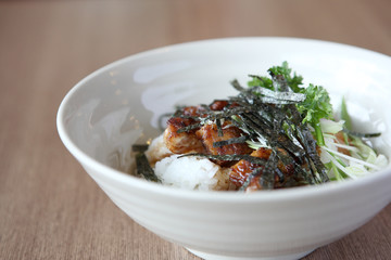 Grilled Chicken teriyaki rice on wood background