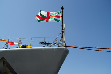 Fototapeta premium Flag waving on a ship