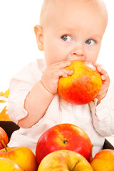 Fototapeta premium Baby eating apple