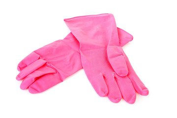 pair of pink household gloves over white background
