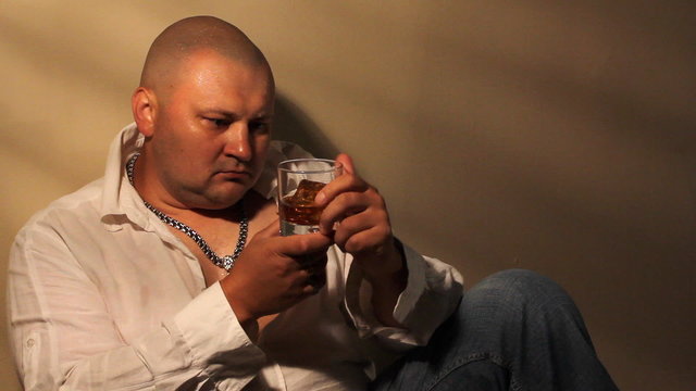 Man drinking whisky