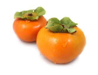 Pair of fresh organic persimmons