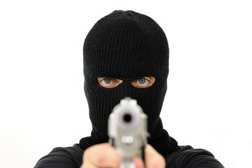 Masked man with gun