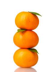 Ripe tasty tangerines isolated on white
