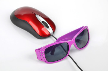 Sunglasses and computer mouse