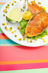 Roasted salmon in the plate