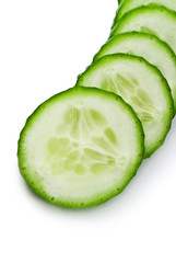 Cucumber  slices isolated over white background