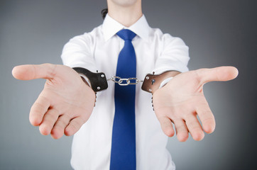 Businessman handcuffed for his crimes