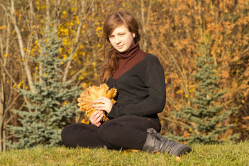 teen girl in autumn park