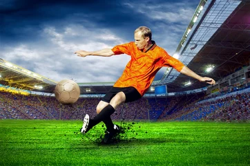 Fotobehang Voetballer op veld van stadion © Andrii IURLOV