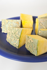 yellow diced pumpkin on a plate