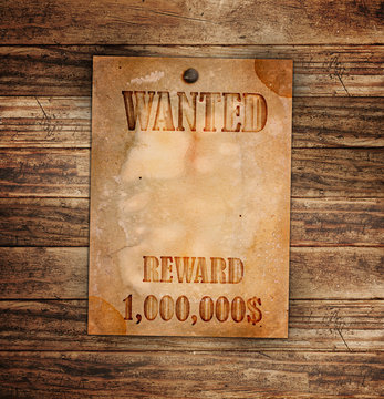 Vintage wanted poster on a wooden wall