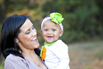 Laughing mother and child