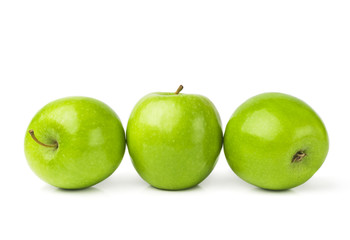 Green apples on a white background