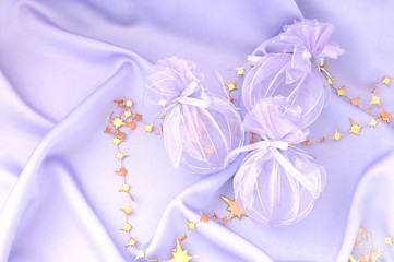 Light purple background with Christmas decorations