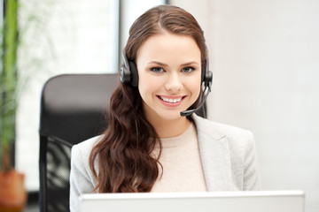 helpline operator with laptop computer