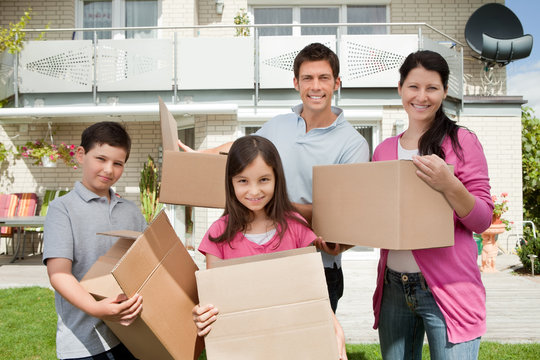 Young Family Shifting Into New House