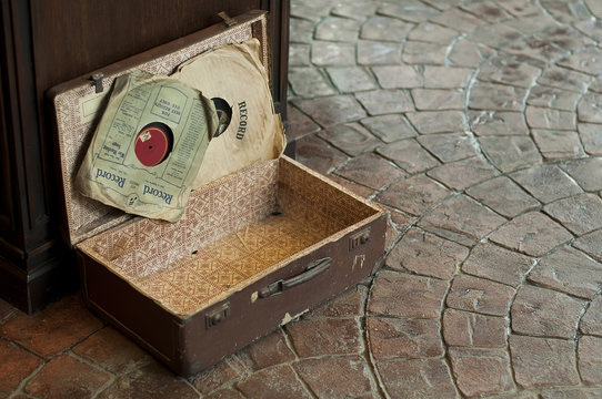Old Antique suitcase with gramophone discs