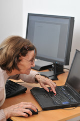 Never old enough - senior woman with computer