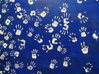 Handprints colors in a mural. Background picture