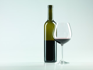 bottle of wine, glass with red wine