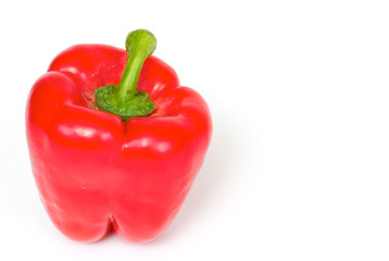Bright red pepper isolated on white.