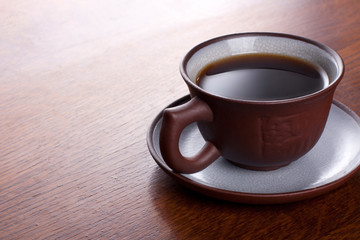 Coffee on the wood background