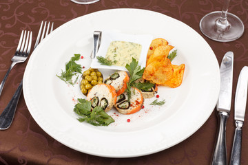 fish roll with sauce and potato chips