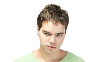 Naklejka premium portrait of sad young man isolated on white background