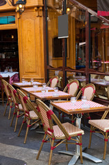Cafe terrace with tables and chairs