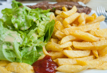 Golden French fries potatoes