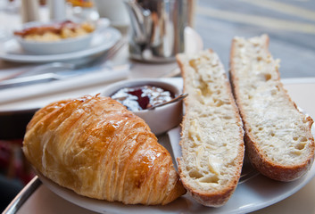 fresh croissant on table