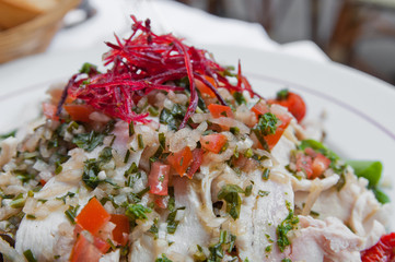 Fresh chicken salad with tomatoes