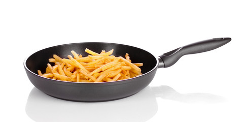 French fries in the pan isolated on white
