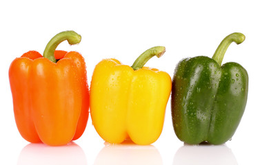 Three bell peppers isolated on white