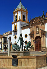 A statue in front of cathedral in Ronda, Andalusia, Spain